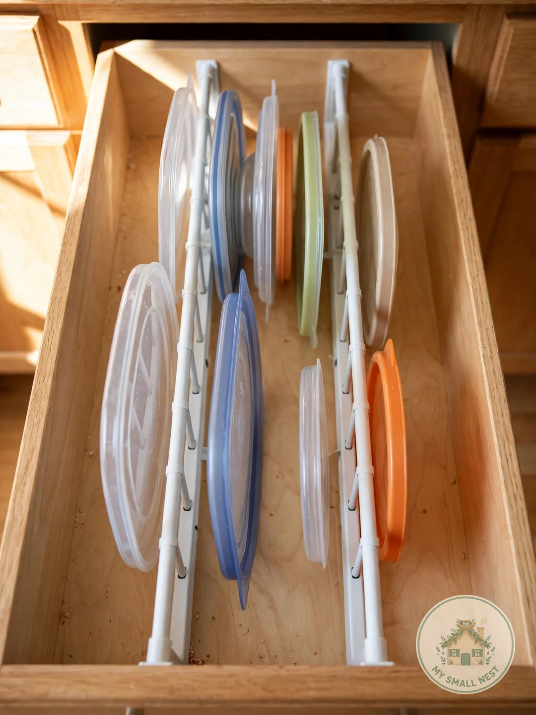 Try the Tension Rod Lid Trick - organize tupperware