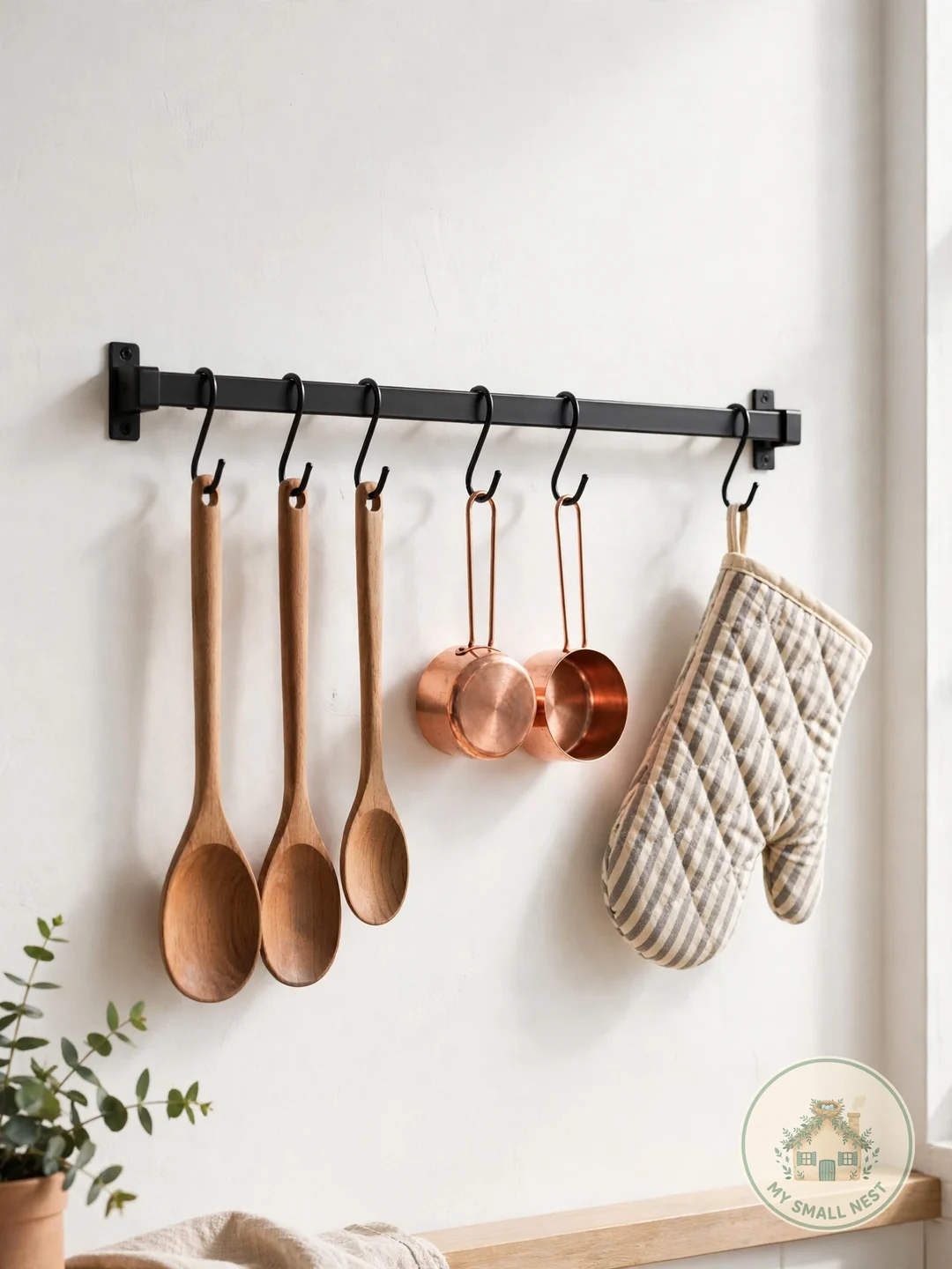 Hang a Slim Rail for Pretty Tools - small kitchen decor